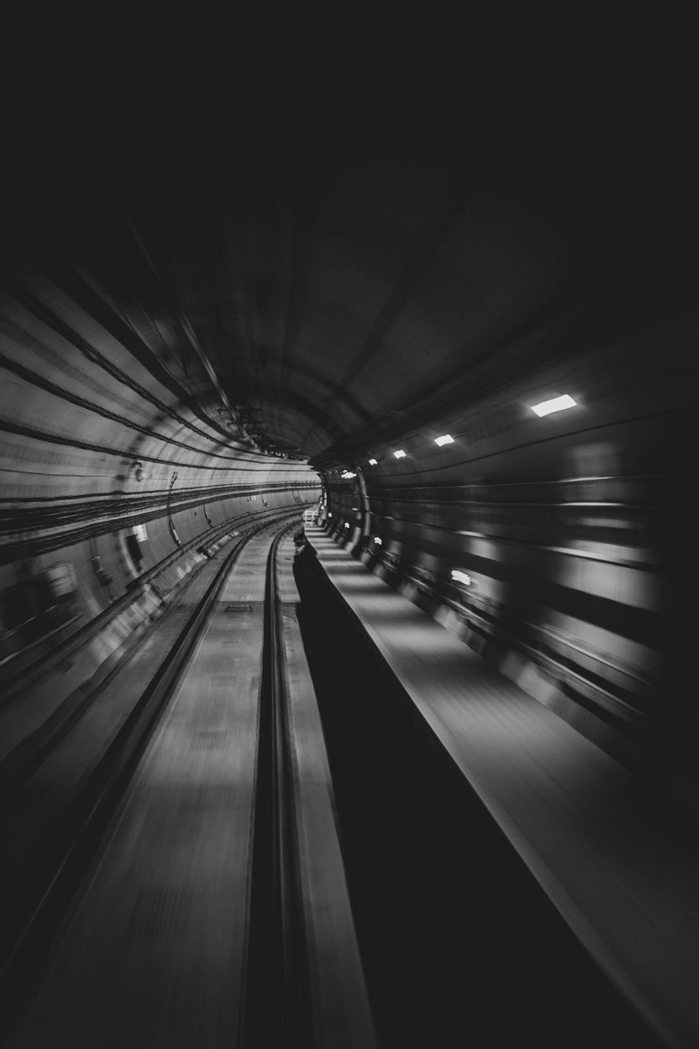 a black and white photo of a subway