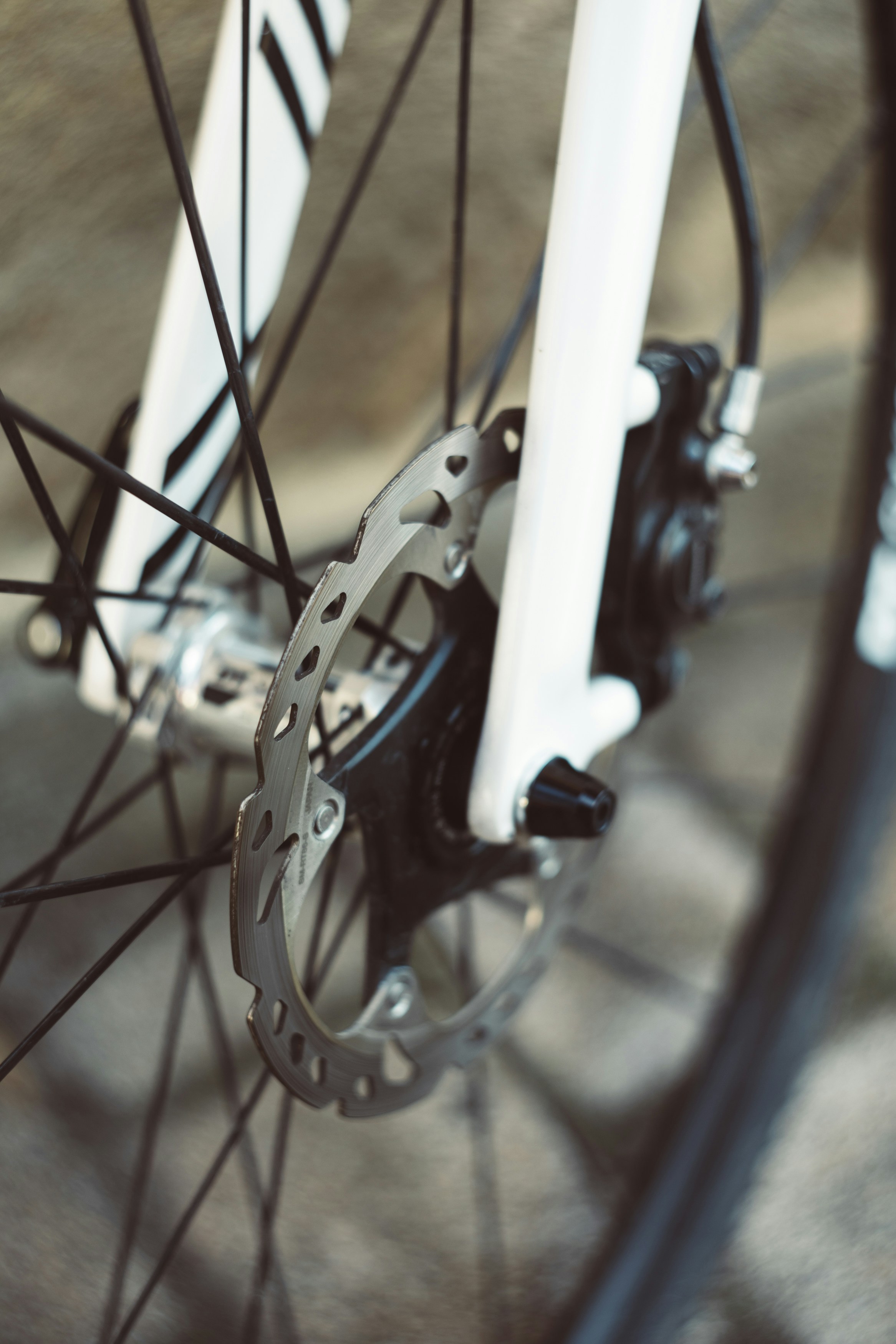 a close up of a bike tire and spokes