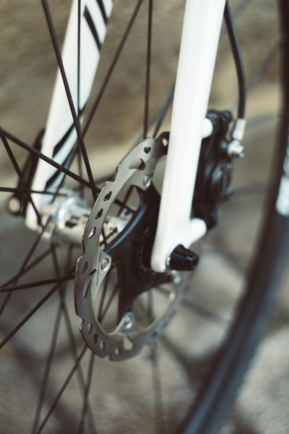 a close up of a bike tire and spokes