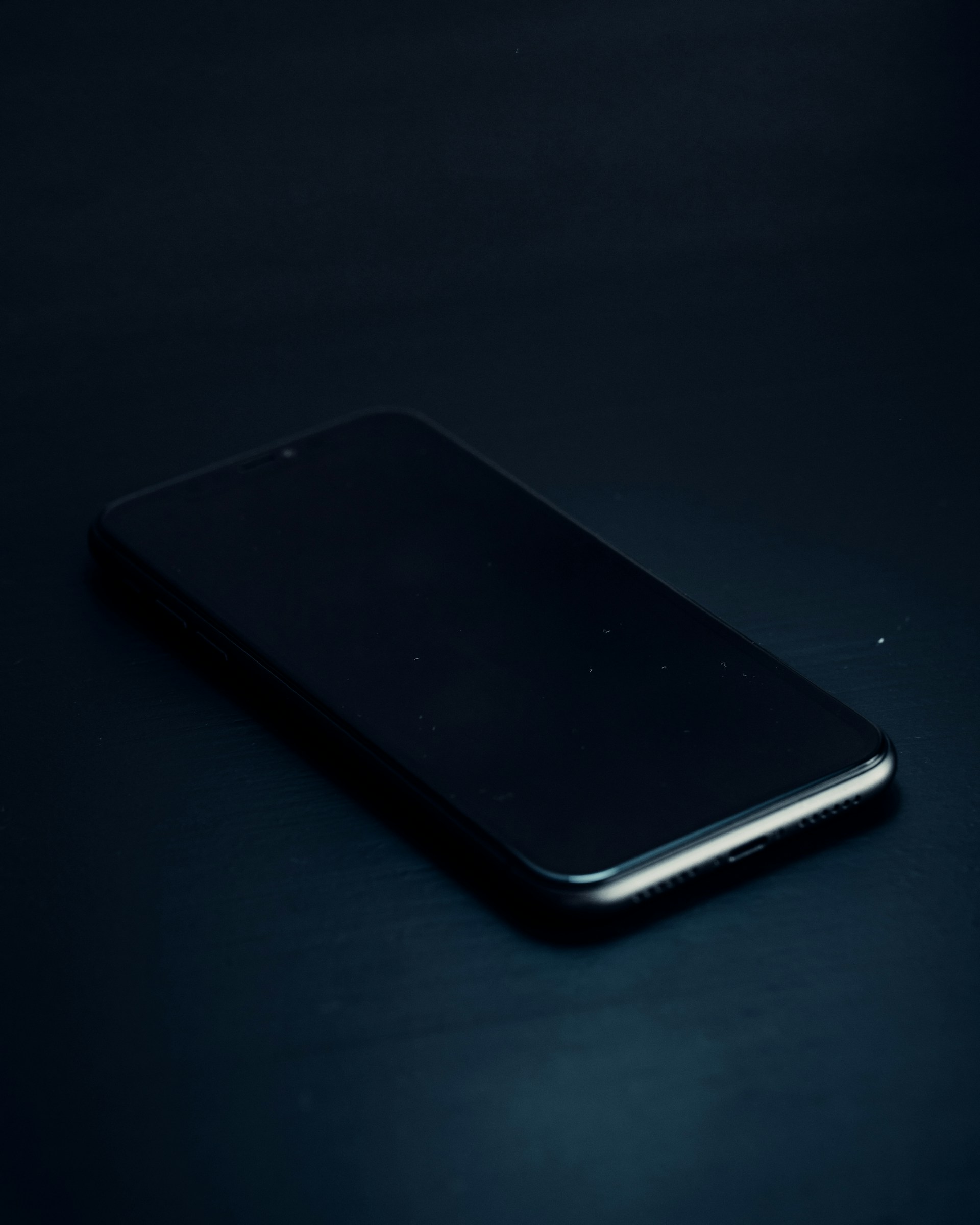 a close up of a cell phone on a table