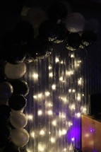 A cheerful party setup with colorful balloons and a photo booth backdrop.