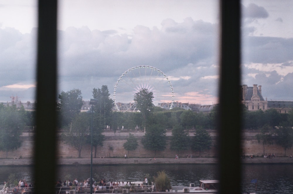 a view of a ferris wheel from a window