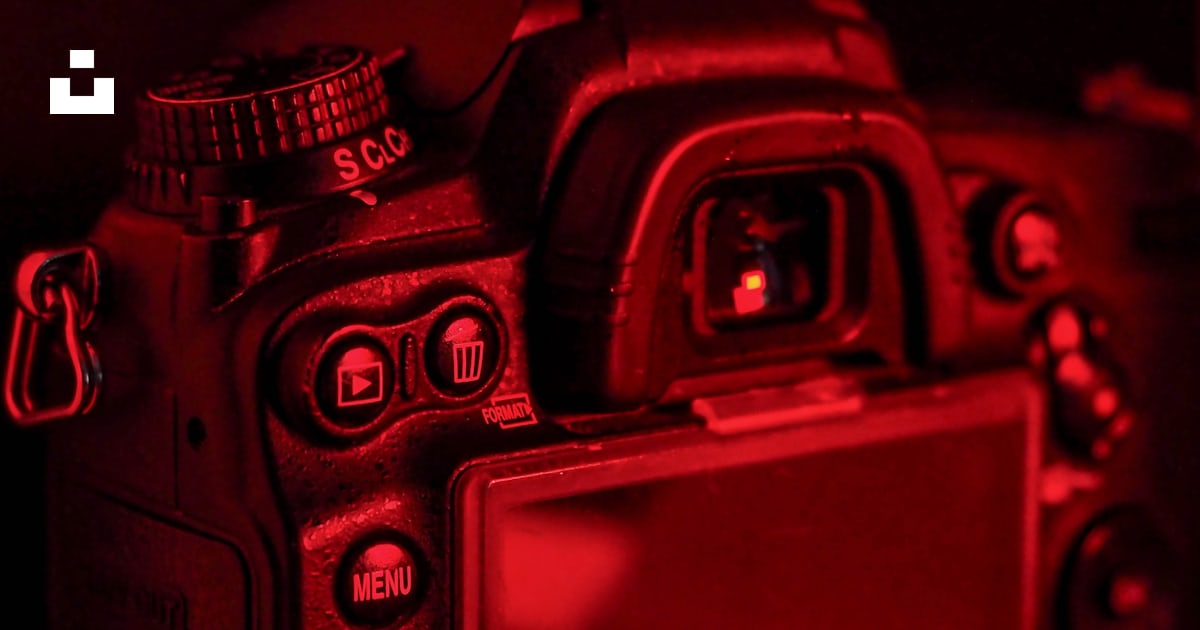 A camera with a red light shining on it photo – Free Nikon Image on ...