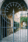 a gate that has a clock on it