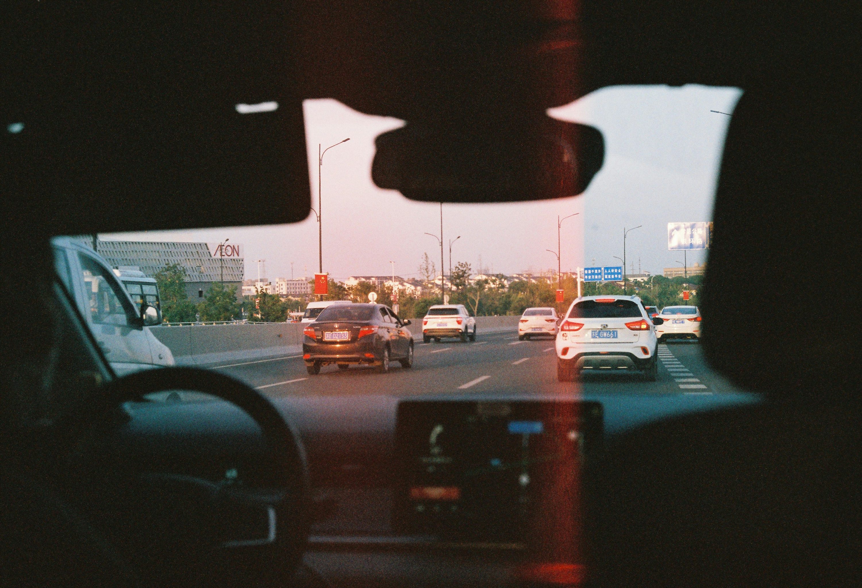 a view from inside a car of traffic on a highway