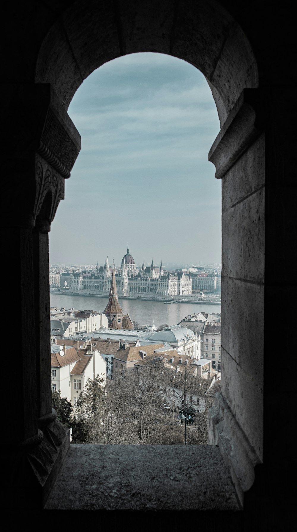 a view of a city from a window in a building