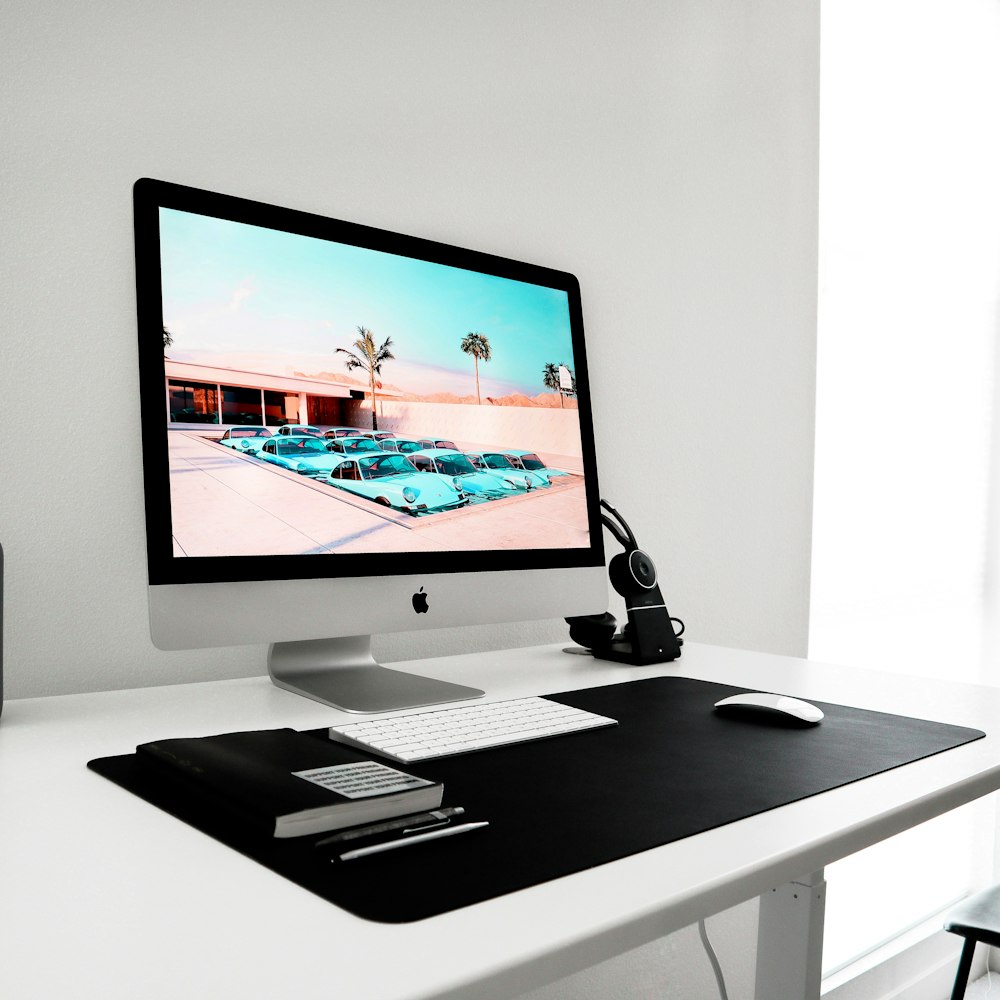 a desktop computer sitting on top of a white desk