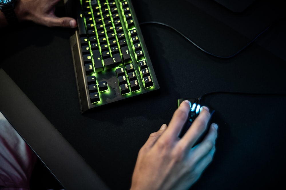 a person is typing on a computer keyboard