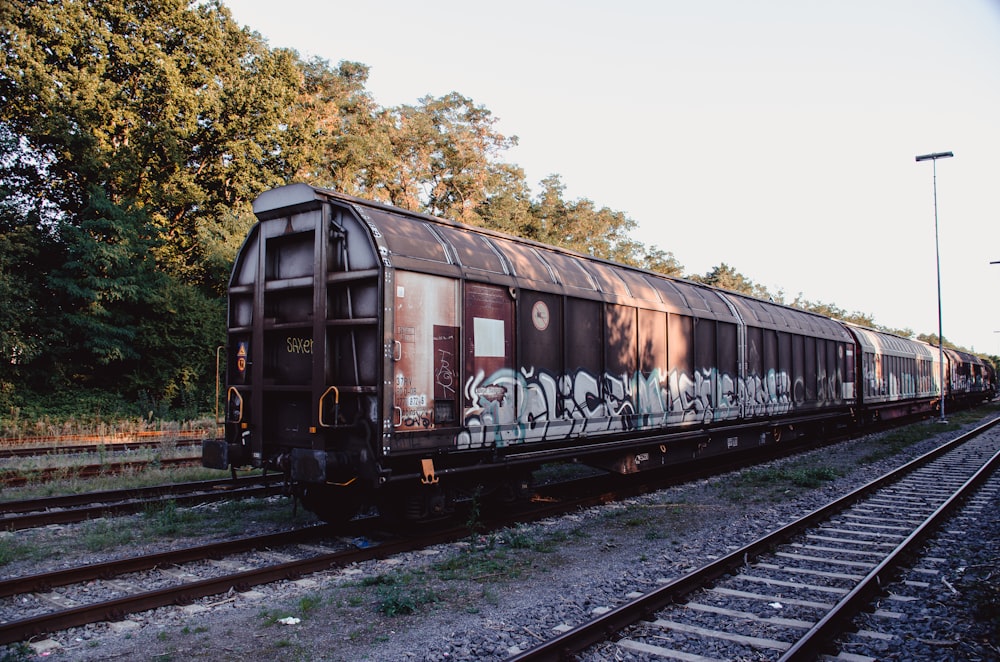 a train car with graffiti on the side of it