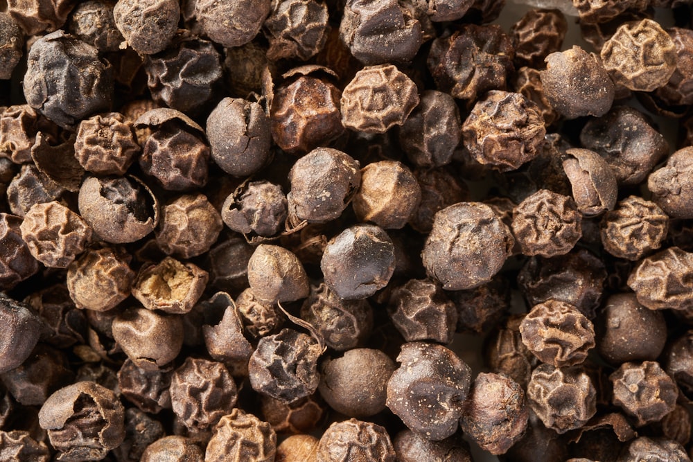 a close up of a bunch of brown mushrooms