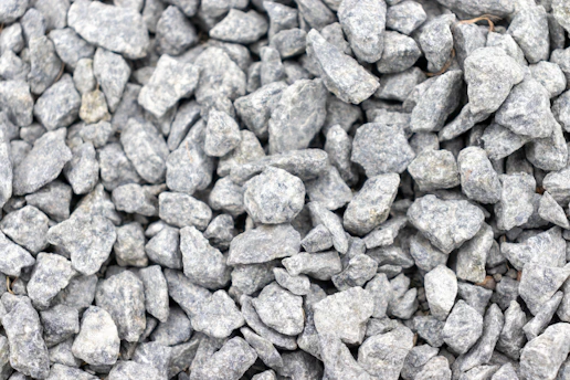Close-up of crushed Brita 0 stones ready for construction use.