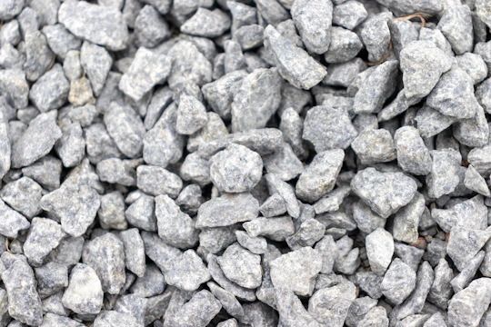 Close-up of crushed Brita 0 stones ready for construction use.