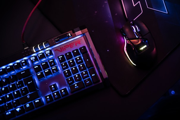 a close up of a keyboard and a mouse
