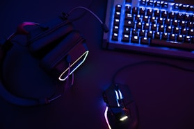 a computer mouse sitting next to a keyboard