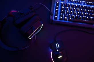 a computer mouse sitting next to a keyboard