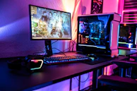 a desktop computer sitting on top of a wooden desk