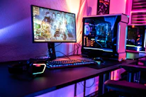 a desktop computer sitting on top of a wooden desk