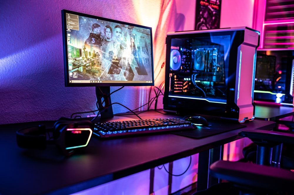 a desktop computer sitting on top of a wooden desk