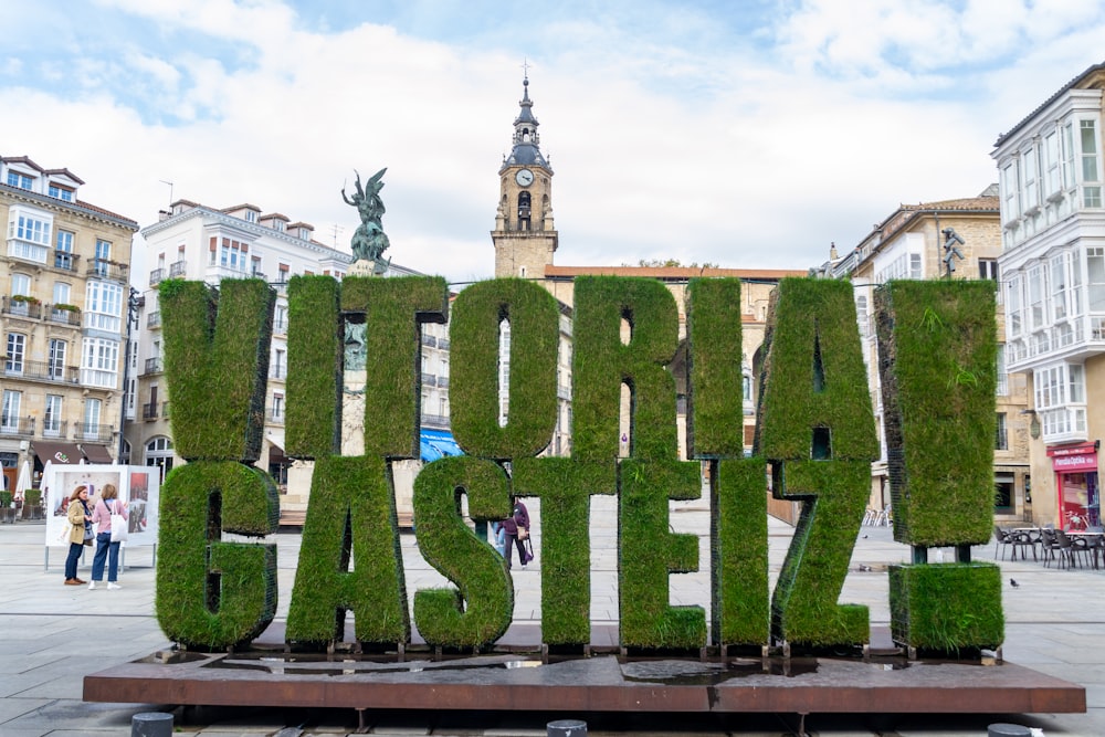 a sculpture of grass in the middle of a city