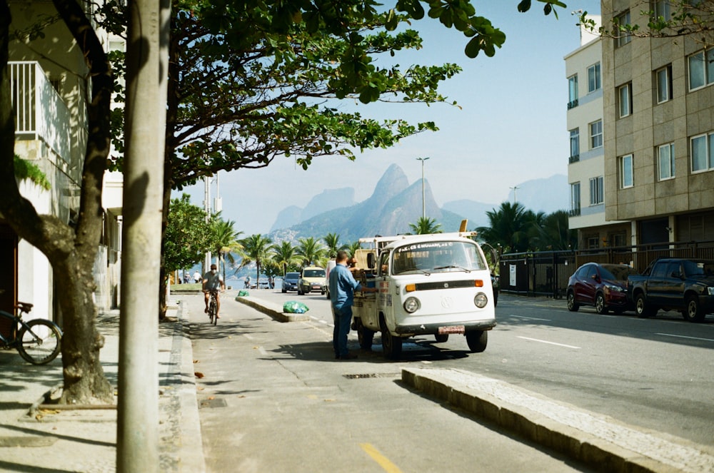 a white van parked on the side of a road