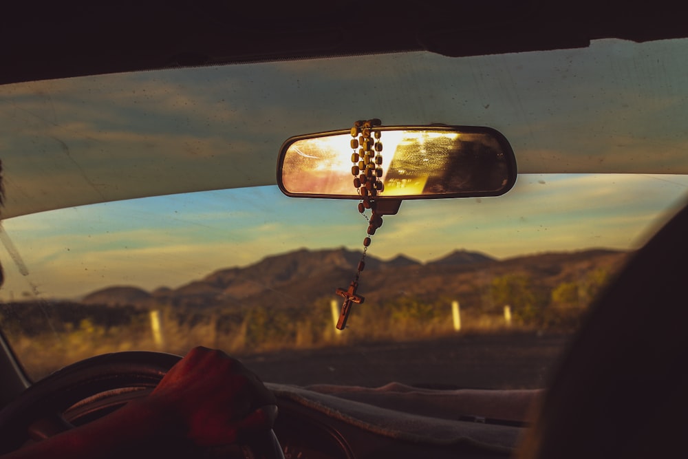 a view of the mountains from inside a car