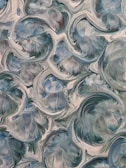an abstract painting of blue and gray colors