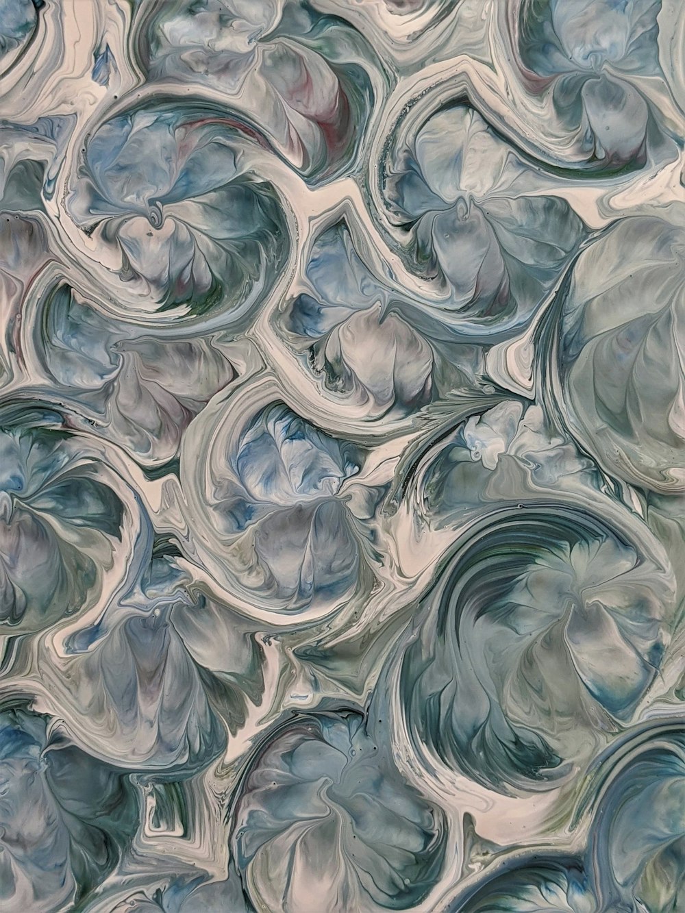 an abstract painting of blue and gray colors