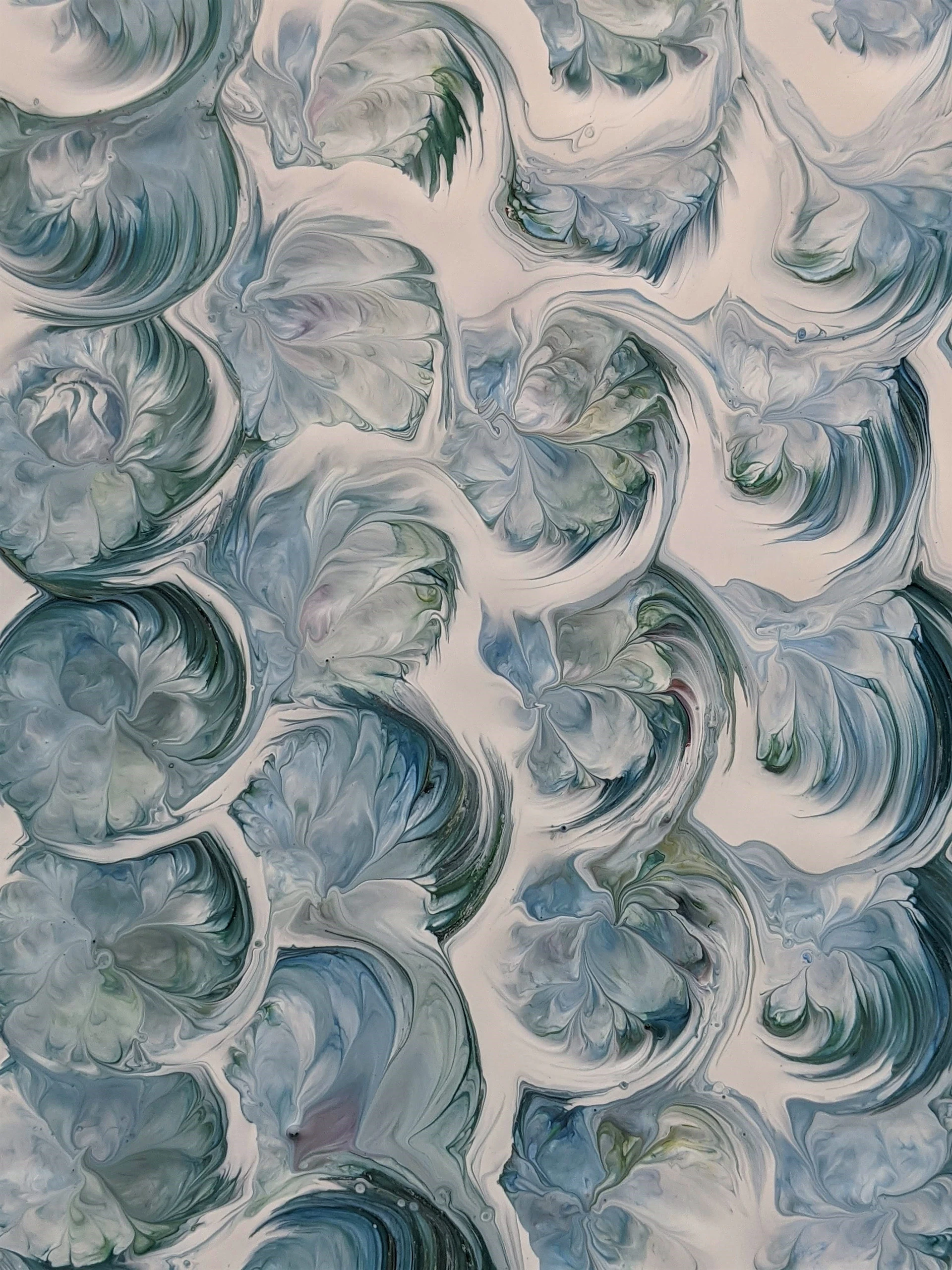 an abstract painting of blue and white colors