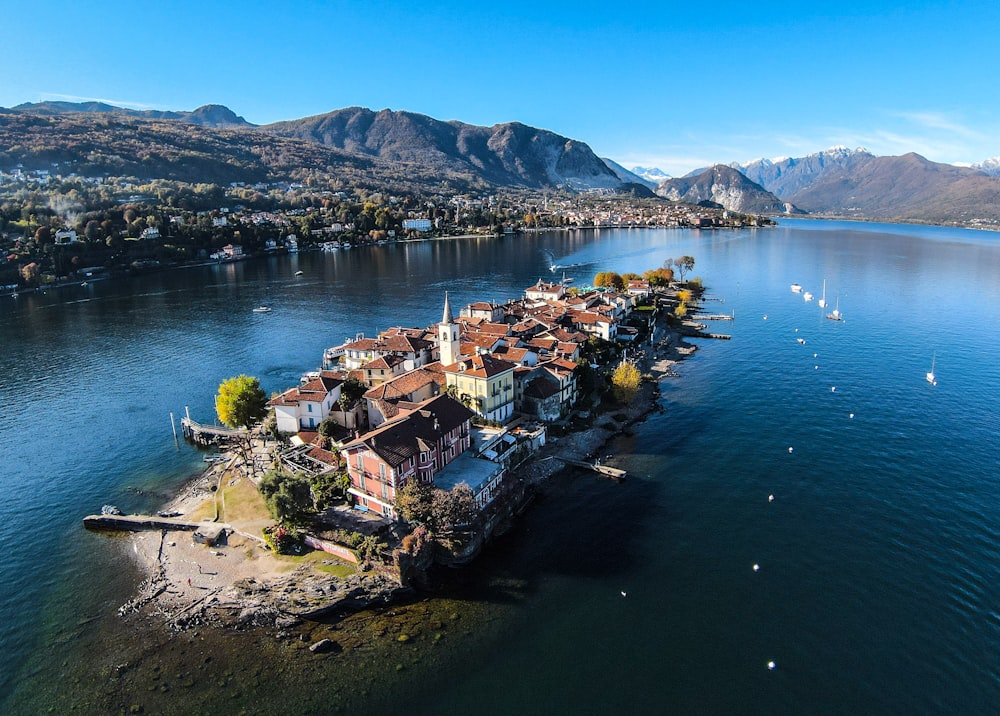 an aerial view of a small island in the middle of a lake