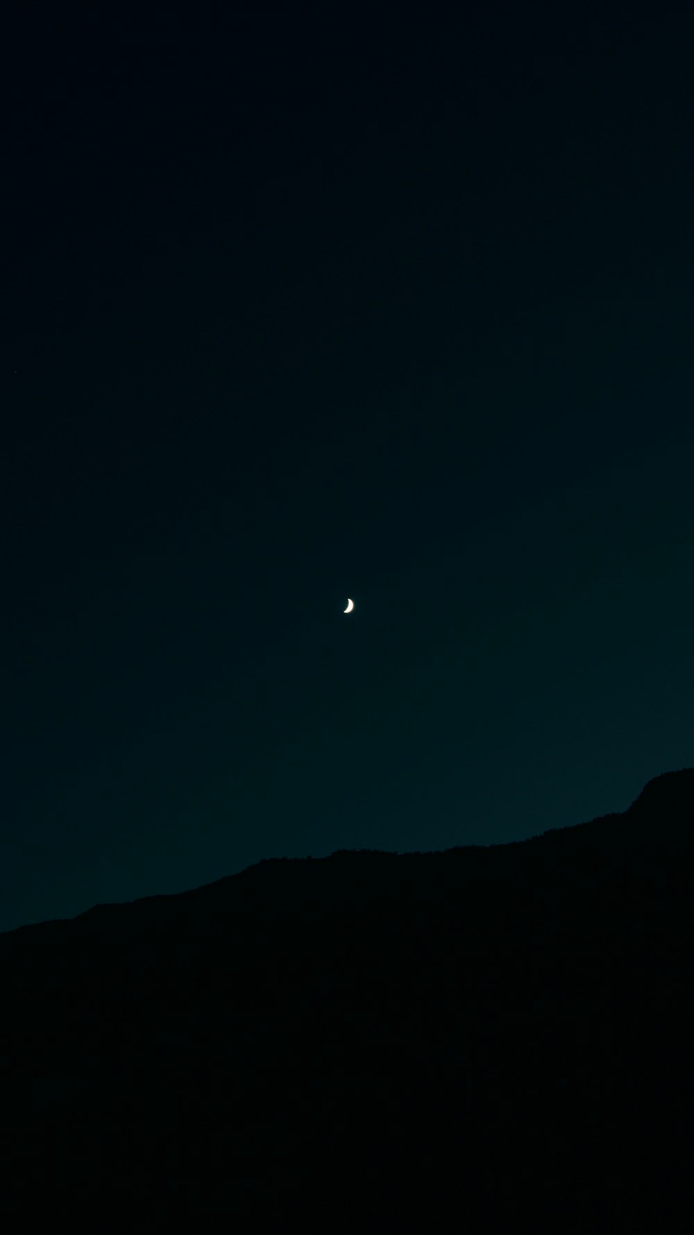 the moon and a distant object in the sky