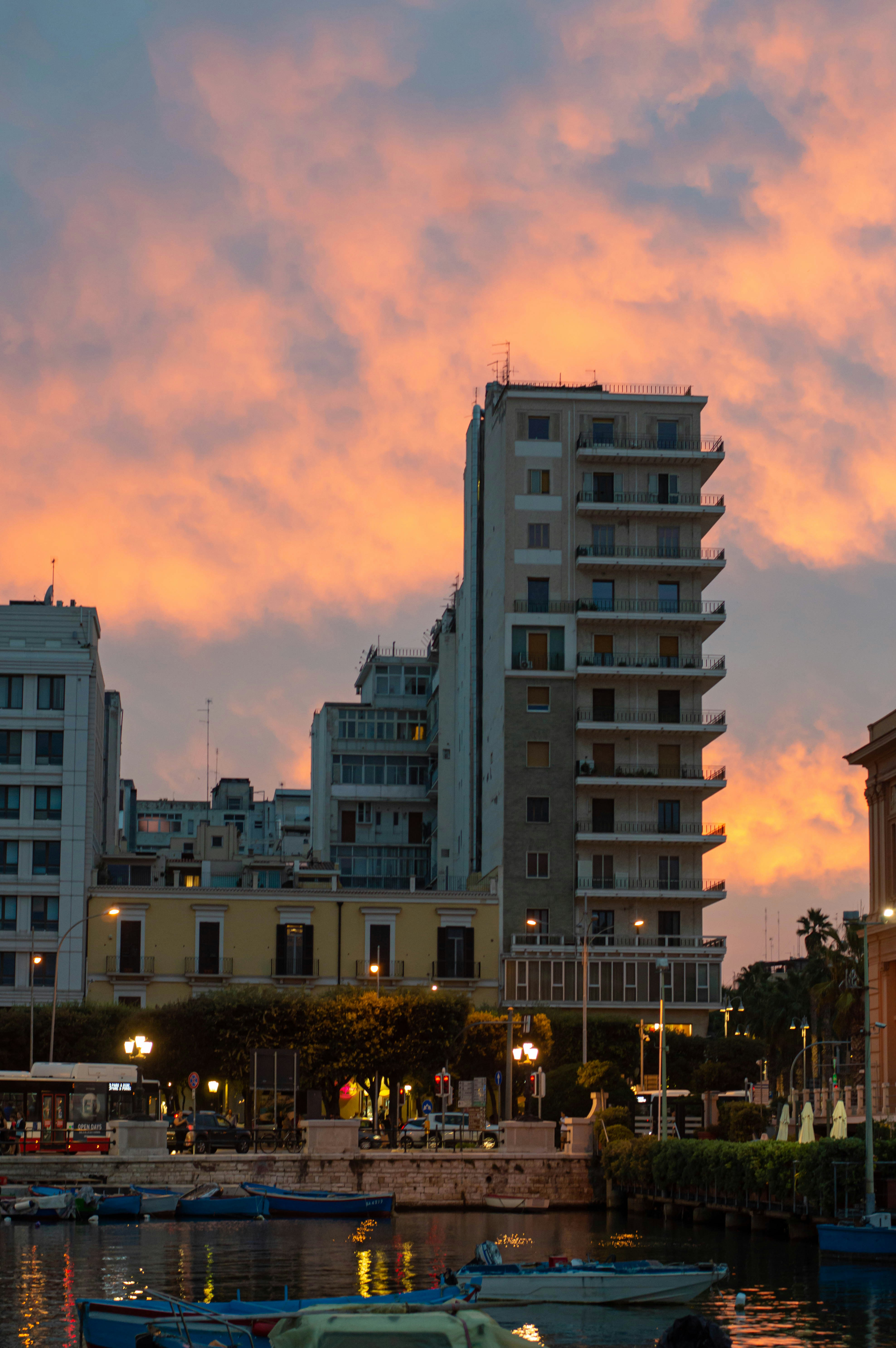 a group of boats floating on top of a body of water