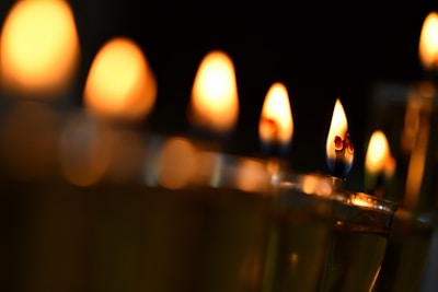 Close-up of flickering candles creating a warm, soothing atmosphere.