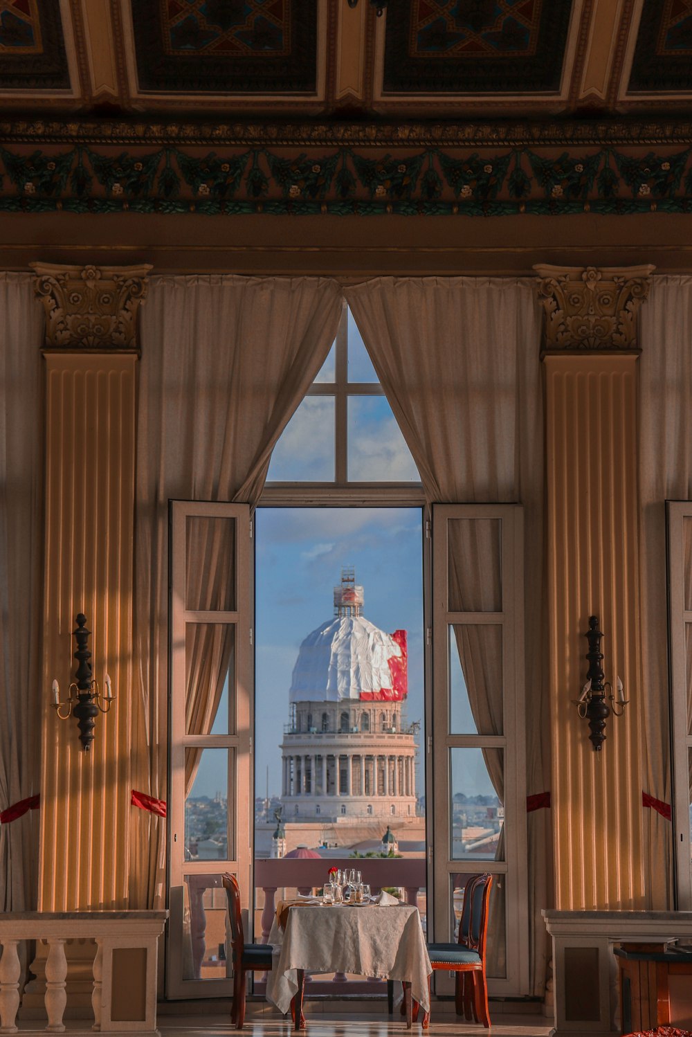 a view of the capital building through a window