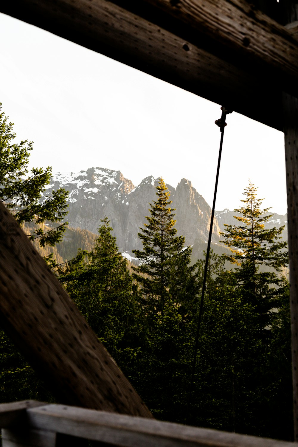 a view of a mountain through a window