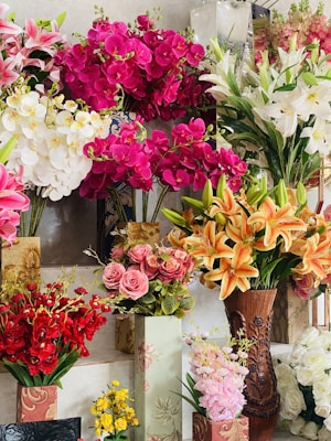 A vibrant display of assorted flowers in elegant arrangements.