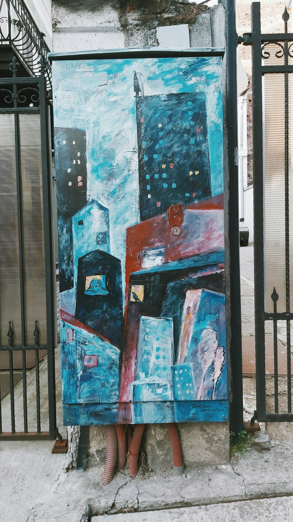 a painting of a cityscape with a person standing in front of it