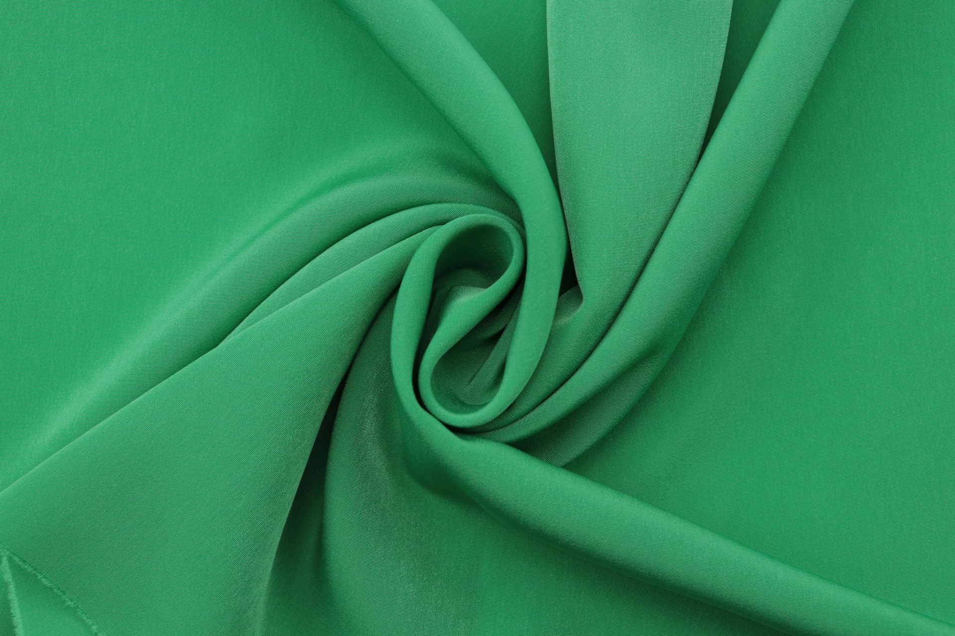 a close up view of a green fabric
