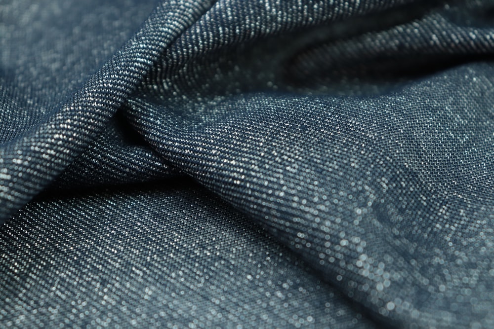 a close up view of a blue fabric