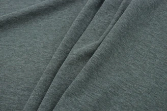 a close up view of a grey fabric