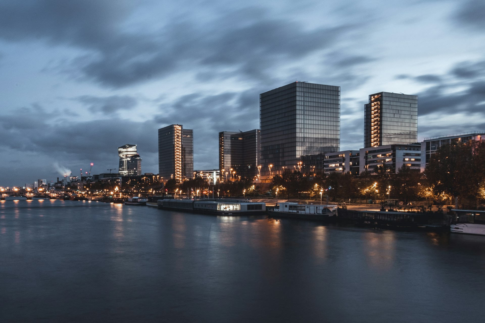 a body of water with a city in the background