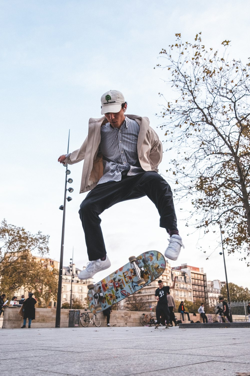 a man is doing a trick on a skateboard