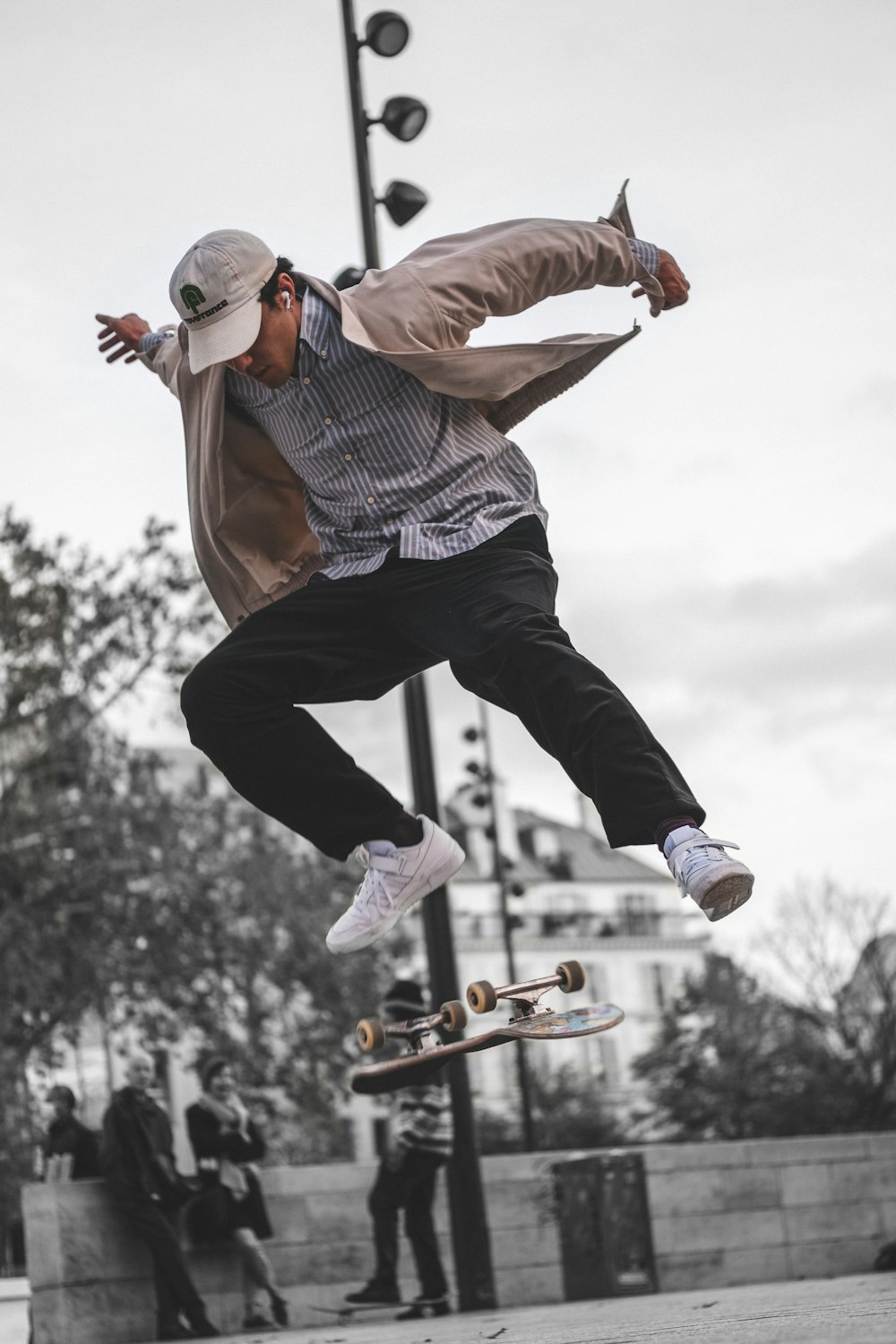 a man flying through the air while riding a skateboard