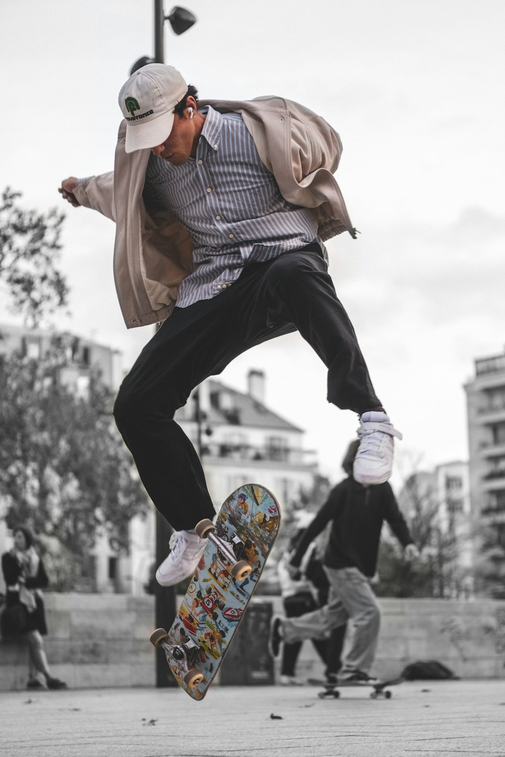 a man flying through the air while riding a skateboard