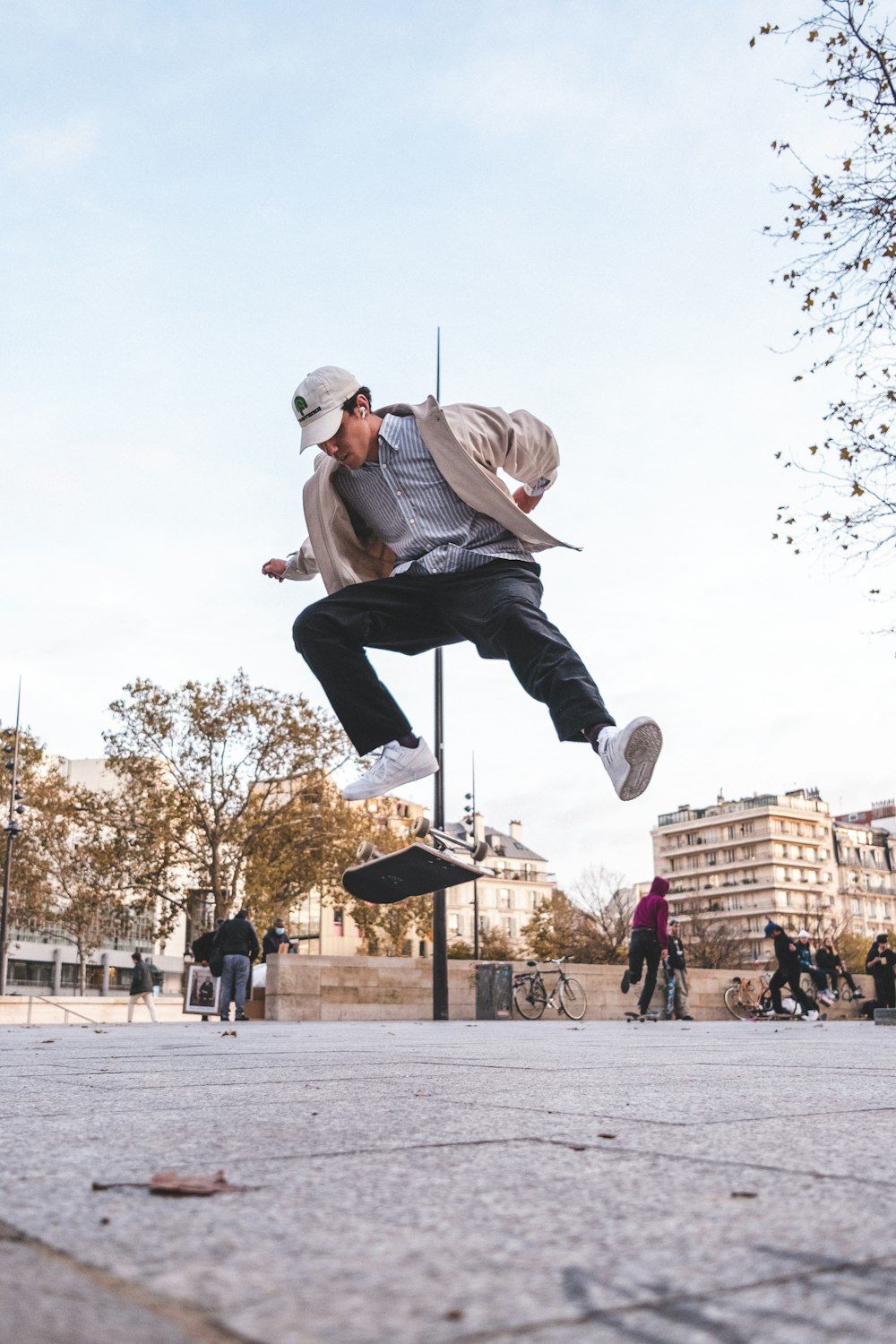 a man flying through the air while riding a skateboard