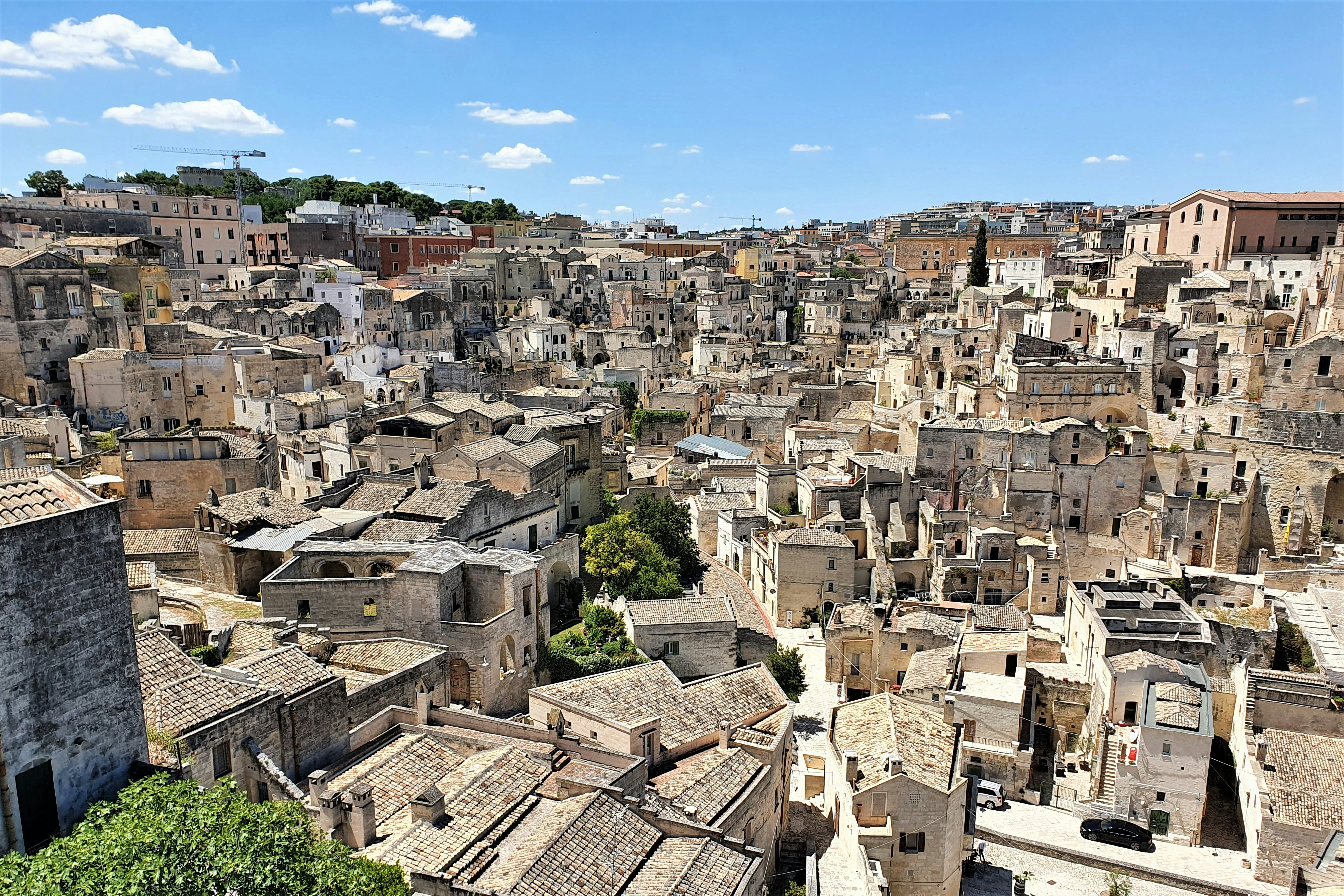 a view of a very old city with lots of buildings, 