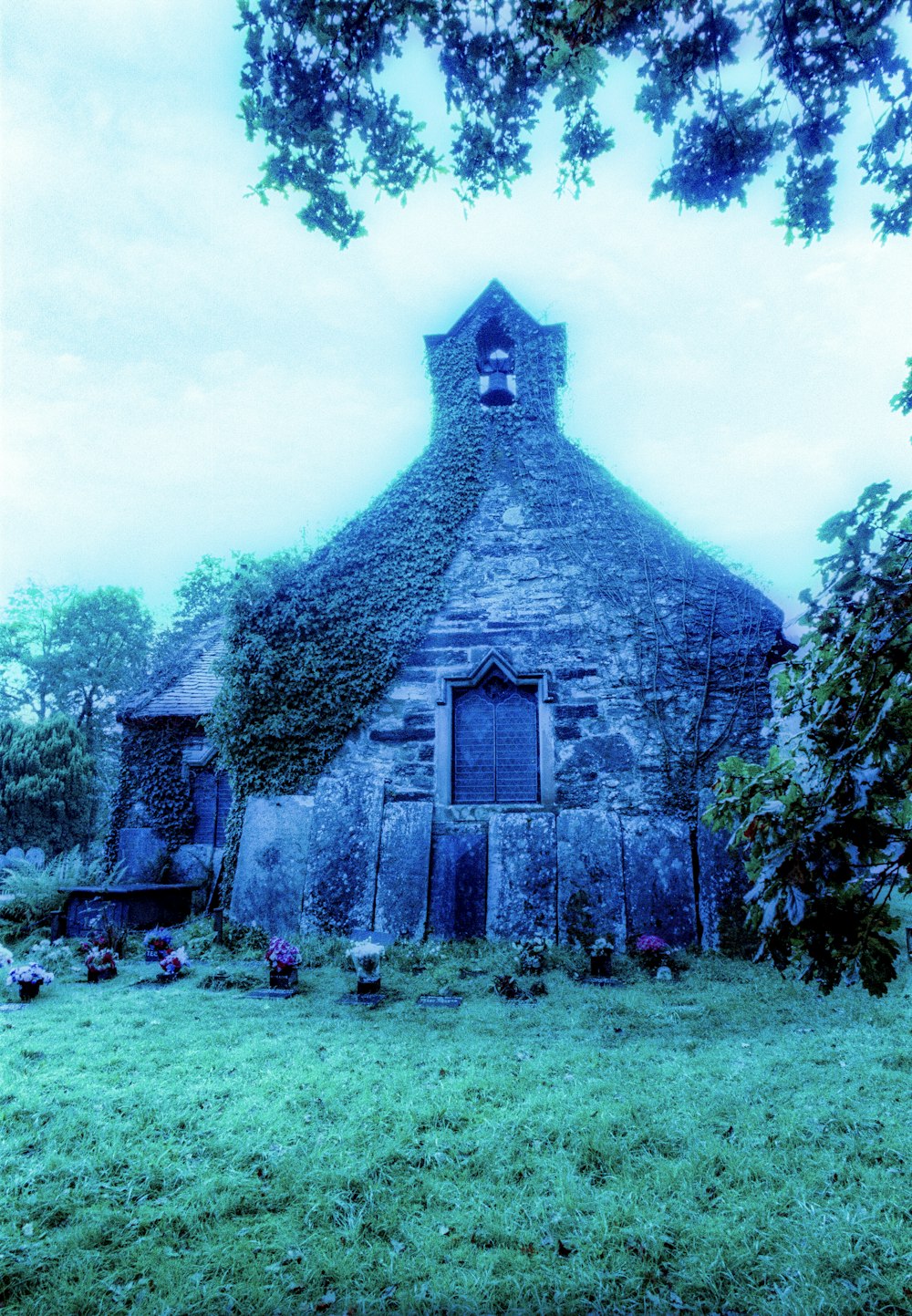 an old stone building with a clock tower