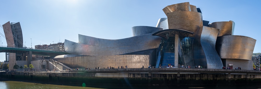 a large building that is next to a body of water