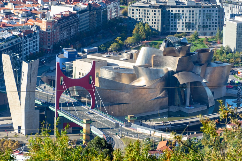 a large building with a bridge going across it