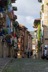a cobblestone street in a european city