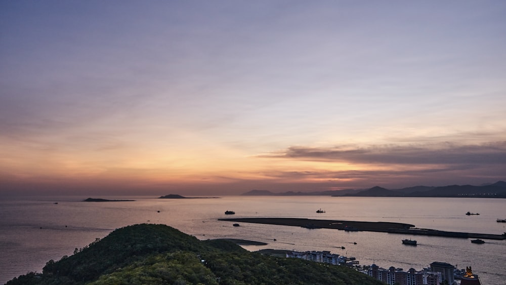 a view of a body of water at sunset